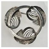 Beau Sterling silver circle brooch