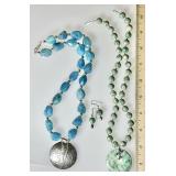 2 gemstone necklaces and earrings