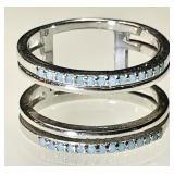 Modern sterling silver ring with pale blue stones