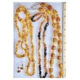 3 amber necklaces and earrings