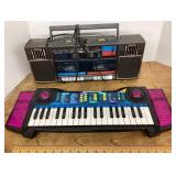 Kawasaki electric piano & Lenoxx Sound boom box