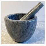 Gray marble mortar and pestle