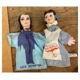 Mary Poppins and Lily Munster hand puppets