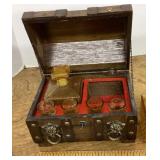 Chest with decanter and shot glasses