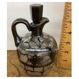 Glass cruet with silver overlay