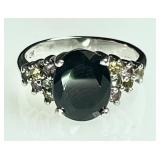 Sterling silver ring with dark blue stone