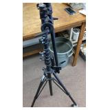 Smith Victor adjustable camera tripod on wheels