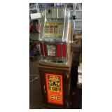 Mills 25 cent slot machine on stand