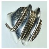 Heavy sterling and 14k gold ring
