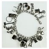 Sterling silver charm bracelet --10 are movable