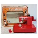 Vintage 1950s Penneys red metal sewing machine