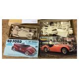 2 plastic car models 1/32 scale Ford and Triumph
