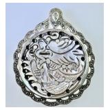 Mother of pearl pendant/brooch set in sterling