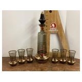 Gold trimmed glass decanter and 6 glasses
