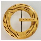 Carved butterscotch Bakelite buckle