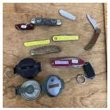 Pocket knives and 2 compasses