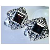 Sterling silver clip earrings with red stone