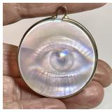 Vintage 1980s hologram eye pendant 9k bezel