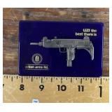 Uzi glass paperweight