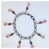 Sterling silver bracelet with pink drops