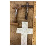 2 crucifixes and a decorative cross