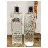 Pair of quilted glass decanters with labels