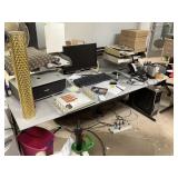 Table and contents with computer and printer