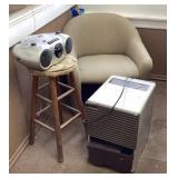 Clean up lot in corner with chair, stool, boombox
