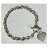 Sterling silver link bracelet with heart charm