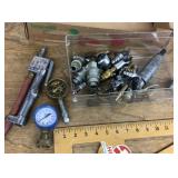 Pneumatic fittings and air gauges