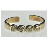 Gold over sterling ring with clear stones