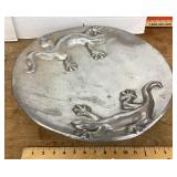 Large metal plate with geckos in relief --Mexico
