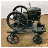 Metal McCormick-Deering engine on wheels