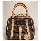 Purse marked Louis Vuitton