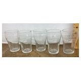 5 small Coca-Cola glasses