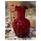 Small hand blown cranberry glass pitcher