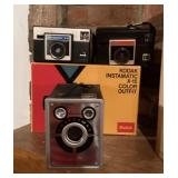 3 vintage cameras