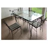Glass top patio table and chairs