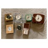Travel alarm and electric clocks