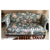 Floral camelback sofa