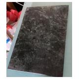 Green marble cutting board on feet