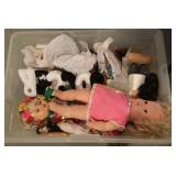 Tote full of dolls, etc.