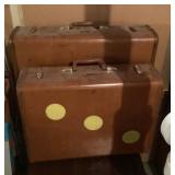 2 leather suitcases