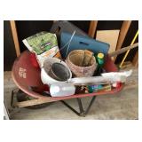 Wheelbarrow and garden supplies