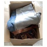 Box of menï¿½s pants, belt, and a tote of hangers