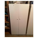 2-door white storage cabinet plus contents