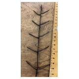 Primitive cast-iron corn cob dryer