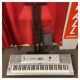 Yamaha digital keyboard with stand