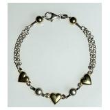 Sterling silver bracelet with goldtone hearts