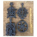4 Cast iron trivets